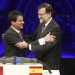 France's Prime Minister Manuel Valls (L) and Spain's Prime Minister Mariano Rajoy embrace during a ceremony to connect a power line between Baixas in France to Santa Llogaia in Spain, in Montesquieu des Alberes, in this February 20, 2015 handout picture. France and Spain's link to carry power across the Pyrenees mountains launched on Friday is one step towards a grand EU plan for the single energy market the European Commission will work towards relentlessly, EU Climate and Energy Commissioner Miguel Arias Canete said. REUTERS/Moncloa/Handout via Reuters (FRANCE - Tags: POLITICS ENERGY BUSINESS TPX IMAGES OF THE DAY) ATTENTION EDITORS - FOR EDITORIAL USE ONLY. NOT FOR SALE FOR MARKETING OR ADVERTISING CAMPAIGNS. THIS IMAGE HAS BEEN SUPPLIED BY A THIRD PARTY. IT IS DISTRIBUTED, EXACTLY AS RECEIVED BY REUTERS, AS A SERVICE TO CLIENTS - RTR4QFB2