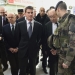 French Prime minister Manuel Valls (C) arrives with French Defence minister Jean-Yves Le Drian (R), French national rail company SNCF Chairman Guillaume Pepy (L Rear) and French Interior minister Bernard Cazeneuve (L) speak with soldiers at the Gare du Nord railway station in Paris, France, November 15, 2015.   REUTERS/Eric Feferberg/Pool     - RTS77FR