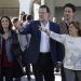 Spain's Prime Minister Mariano Rajoy (C) gestures next to regional president Isabel Bonig (R) as he arrives at a meeting with People Party's candidates for parliament and supporters ahead the upcoming general elections next month in Valencia, Spain, November 28, 2015. REUTERS/Heino Kalis - RTX1W7Z9