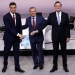 Spain's Prime Minister and ruling People's Party (PP) leader Mariano Rajoy (R) and Socialist leader Pedro Sanchez stand as host Manuel Campo Vidal (C) looks on before a live televised debate in Madrid, Spain, December 14, 2015.   REUTERS/Juan Medina - RTX1YOJL