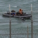 Inmigrantes frente a la valla de Ceuta. Foto de archivo de Reuters