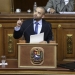 Venezuelan singer Miguel Ignacio Mendoza (C), known as Nacho, member of pop duo "Chino & Nacho", addresses during the special session of the National Assembly commemorating the Day of the Youth, in front of Henry Ramos, president of the National Assembly and deputy of the Venezuelan coalition of opposition parties (MUD), in Caracas, February 12, 2016. REUTERS/Marco Bello - RTX26PM5