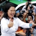 Peru's presidential candidate Keiko Fujimori waves to supporters and press after voting at presidential election in Lima, Peru, April 10, 2016.  REUTERS/Mariana Bazo      TPX IMAGES OF THE DAY      - RTX29C3Q