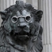 A lion statue outside Spain's parliament in Madrid, Spain, is seen fitted with glasses to celebrate Spanish writer Miguel de Cervantes' famous novel "Don Quijote" (Don Quixote), as part of a commemoration of the 400th anniversary of the writer's death, April 19, 2016. REUTERS/Andrea Comas - RTX2AMTF