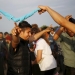 Men dance at a makeshift camp for migrants and refugees at the Greek-Macedonian border near the village of Idomeni, Greece, April 19, 2016.  REUTERS/Stoyan Nenov - RTX2AP3Y