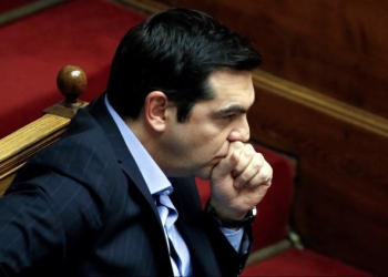 Greek Prime Minister Alexis Tsipras attends a parliamentary session before a vote of tax and pension reforms in Athens, Greece, May 8, 2016. REUTERS/Alkis Konstantinidis - RTX2DDPC