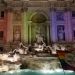 Lights are projected onto the Trevi Fountain to make it look rainbow coloured to celebrate the civil unions bill in Rome May 11, 2016. REUTERS/Alessandro Bianchi - RTX2DW5S