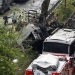 Forensic experts (L) and firefighters stand beside a Turkish police bus which was targeted in a bomb attack in a central Istanbul district, Turkey, June 7, 2016. REUTERS/Osman Orsal - RTSGCHO