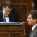 Ciudadanos party leader Albert Rivera (R) walks past Spain's acting Prime Minister Mariano Rajoy during a parliamentary session in Madrid, Spain, April 6, 2016. REUTERS/Andrea Comas - RTSDSSZ