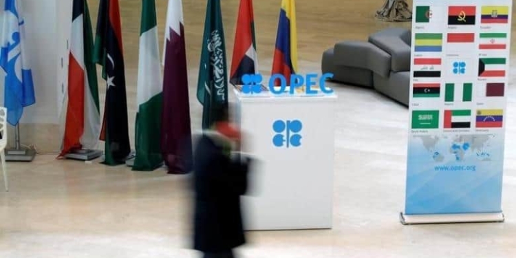 A man walks past an OPEC logo ahead of an informal meeting between members of the Organization of the Petroleum Exporting Countries (OPEC) in Algiers, Algeria September 28, 2016. REUTERS/Ramzi Boudina