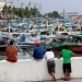 Residents look Filipinas, a la espera de la llegada del tifón Nock Ten. FOTO: Reuters