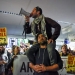 Demonstrators shout slogans during anti-Donald Trump immigration ban protests inside Terminal 4 at San Francisco International Airport in San Francisco, California, U.S., January 28, 2017. REUTERS/Kate Munsch