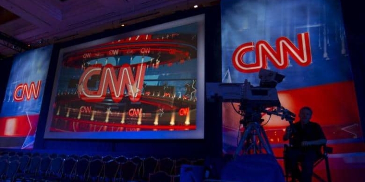 A CNN camera operator waits by his camera as the network prepares  for the first democratic presidential candidate debate at the Wynn Hotel in Las Vegas, Nevada October 13, 2015.   REUTERS/Mike Blake
