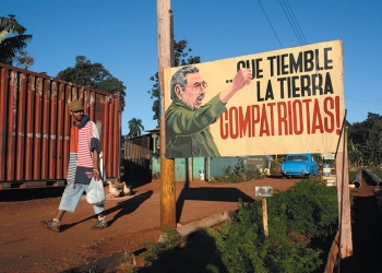 A sign showing Cuban President Raúl Castro, and saying ‘May the earth tremble, compatriots!,’ Havana, Cuba, December 2014