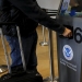 A traveler has his passport scanned as he passes through U.S. Customs and Immigration after using the Cross Border Xpress pedestrian bridge between San Diego and the Tijuana airport on the facility's opening day in Otay Mesa, California December 9, 2015. REUTERS/Mike Blake