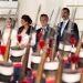 Spain's Queen Letizia, Argentina's first lady Juliana Awada, Argentina's President Mauricio Macri and Spain's King Felipe (L-R) attend a military parade during the welcoming ceremony at Royal Palace in Madrid, Spain February 22, 2017. REUTERS/Sergio Perez - RTSZRLN