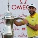 Sergio Garcia of Spain poses with the trophy following the final round of the Omega Dubai Desert Classic at the Emirates Golf Club, on February 5, 2017 in Dubai. / AFP PHOTO / KARIM SAHIB