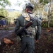 A member of the 51st Front of the Revolutionary Armed Forces of Colombia (FARC) walks at a camp in Cordillera Oriental, Colombia, August 16, 2016.  REUTERS/John Vizcaino