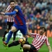 Barcelona's Argentinian forward Lionel Messi (L) vies with Athletic Bilbao's defender Yeray Alvarez during the Spanish league football match FC Barcelona vs Athletic Club Bilbao at the Camp Nou stadium in Barcelona on February 4, 2017. / AFP PHOTO / LLUIS GENE