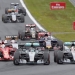 Mercedes Formula One driver Nico Rosberg of Germany (C) leads the pack after overtaking his team mate Lewis Hamilton of Britain (R) at the start of the Austrian F1 Grand Prix at the Red Bull Ring circuit in Spielberg, Austria, June 21, 2015.   REUTERS/Laszlo Balogh