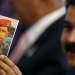 Venezuela's President Nicolas Maduro holds a photo of former Venezuelan President Hugo Chavez during the meeting of China and CELAC at Itamaraty Palace in Brasilia July 17, 2014. Brazil hosted the meeting of China and Community of Latin American and Caribbean States (CELAC). REUTERS/Ueslei Marcelino (BRAZIL - Tags: POLITICS)