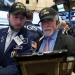 Traders work on the main trading floor of the New York Stock Exchange (NYSE) as the Dow Jones Industrial Average passes the 20,000 mark shortly after the opening of the trading session in New York, U.S., January 25, 2017. REUTERS/Brendan McDermid