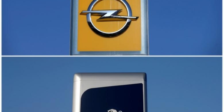 FILE PHOTO: A combination picture shows the logos of Opel and Peugeot car manufacturers at dealerships of the brands in Strasbourg, France, February 14, 2017. REUTERS/Vincent Kessler/File Photo