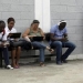 Young people use the internet via the free wifi at the studio of Cuban artist Alexis Leyva "Kcho" in Havana March 24, 2015.   REUTERS/Enrique de la Osa