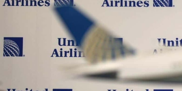 Logos are pictured on a wall before a news conference announcing the merger between Continental Airlines and United Airlines in New York, May 3, 2010. REUTERS/Shannon Stapleton