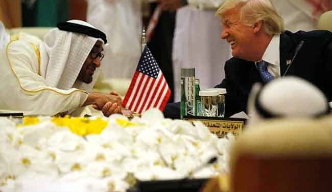 U.S. President Donald Trump shakes hands with Abu Dhabi Crown Prince and Deputy Supreme Commander of the United Arab Emirates (UAE) Armed Forces Mohammed bin Zayed al-Nahayan as he sits down to a meeting with of Gulf Cooperation Council leaders during their summit in Riyadh, Saudi Arabia May 21, 2017. REUTERS/Jonathan Ernst - RTX36SZO