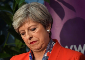 Britain's Prime Minister Theresa May waits for the result of the vote in her constituency at the count centre for the general election in Maidenhead, June 9, 2017. REUTERS/Toby Melville - RTX39QYF