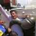 Venezuelan opposition leader Leopoldo Lopez gets into a National Guard armored vehicle in Caracas February 18, 2014. Lopez, wanted on charges of fomenting deadly violence, handed himself over to security forces on Tuesday, Reuters witnesses said. Lopez, a 42-year-old U.S.-educated economist who has spearheaded a recent wave of protests in Venezuela, got into an armored vehicle after giving a speech to an opposition rally in Caracas. REUTERS/Jorge Silva (VENEZUELA - Tags: POLITICS CIVIL UNREST TPX IMAGES OF THE DAY)