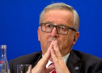 European Commission President Jean-Claude Juncker, listens during to a speech during the 11th EU-China Business Summit at the Great Hall of the People in Beijing, Wednesday, July 13, 2016. REUTERS/Ng Han Guan/Pool