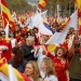 Gritos de "Puigdemont a prisión" en la manifestación del 12-O en Barcelona