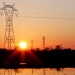 Pylons of high-tension electricity power lines are seen during sunset in Bordeaux, France, January 27, 2018. REUTERS/Regis Duvignau