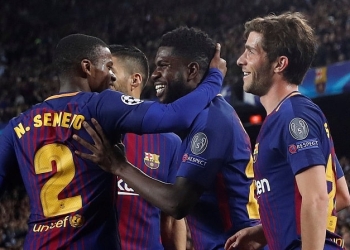 Soccer Football - Champions League Quarter Final First Leg - FC Barcelona vs AS Roma - Camp Nou, Barcelona, Spain - April 4, 2018   Barcelona's Samuel Umtiti celebrates their second goal with Nelson Semedo and team mates   REUTERS/Juan Medina