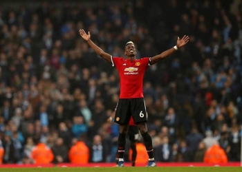 Soccer Football - Premier League - Manchester City vs Manchester United - Etihad Stadium, Manchester, Britain - April 7, 2018   Manchester United's Paul Pogba celebrates after the match                          REUTERS/Russell Cheyne    EDITORIAL USE ONLY. No use with unauthorized audio, video, data, fixture lists, club/league logos or "live" services. Online in-match use limited to 75 images, no video emulation. No use in betting, games or single club/league/player publications.  Please contact your account representative for further details.