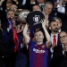 Soccer Football - Spanish King's Cup Final - FC Barcelona v Sevilla - Wanda Metropolitano, Madrid, Spain - April 21, 2018   Barcelona's Andres Iniesta celebrates by lifting the trophy after the match as the King of Spain Felipe VI applauds   REUTERS/Juan Medina