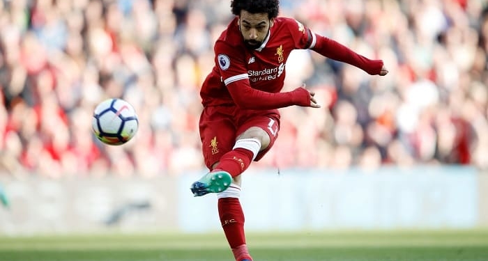 Soccer Football - Premier League - Liverpool vs AFC Bournemouth - Anfield, Liverpool, Britain - April 14, 2018   Liverpool's Mohamed Salah shoots at goal    Action Images via Reuters/Carl Recine    EDITORIAL USE ONLY. No use with unauthorized audio, video, data, fixture lists, club/league logos or "live" services. Online in-match use limited to 75 images, no video emulation. No use in betting, games or single club/league/player publications.  Please contact your account representative for further details.