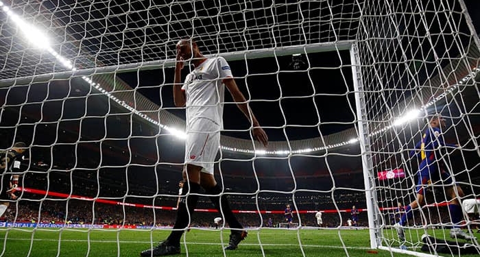 Soccer Football - Spanish King's Cup Final - FC Barcelona v Sevilla - Wanda Metropolitano, Madrid, Spain - April 21, 2018   Sevilla's Steven N'Zonzi reacts after Barcelona's Lionel Messi scores their second goal    REUTERS/Susana Vera