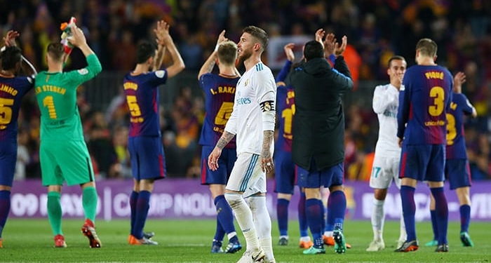Soccer Football - La Liga Santander - FC Barcelona v Real Madrid - Camp Nou, Barcelona, Spain - May 6, 2018   Real Madrid's Sergio Ramos looks dejected as Barcelona's Marc-Andre ter Stegen and team mates applaud the fans at the end of the match    REUTERS/Albert Gea