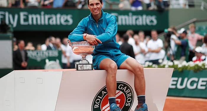 Tennis - French Open - Roland Garros, Paris, France - June 10, 2018   Spain's Rafael Nadal celebrates with the trophy after winning the final against Austria's Dominic Thiem    REUTERS/Benoit Tessier