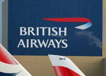 Foto de archivo del logo de British Airways y de la cola de varios de sus aviones en el aeropuerto de Heathrow en Londres, 23 de febrero de 2018. REUTERS/Hannah McKay