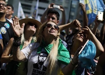 Simpatizantes del candidato presidencial Jair Bolsonaro asisten a un acto en Río de Janeiro, Brasil, 9 de septiembre de 2018. REUTERS/Pilar Olivares