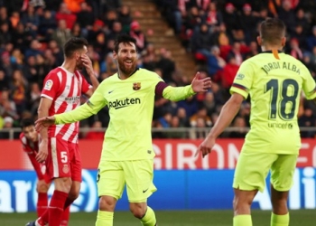 Lionel Messi y Jordi Alba celebran el segundo gol ante el Girona en Montilivi