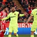 Lionel Messi y Jordi Alba celebran el segundo gol ante el Girona en Montilivi