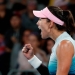 Garbiñe Muguruza celebra un punto ante la suiza Timea Bacsinszky. REUTERS