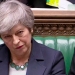 La primera ministra Theresa May escucha antes de una votación sobre el Brexit en el parlamento británico en Londres.