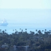 An oil tanker and a container ship sit off shore of the port of the Long Beach during the outbreak of the coronavirus disease (COVID-19) in Long Beach, California, U.S., April 23, 2020. RE